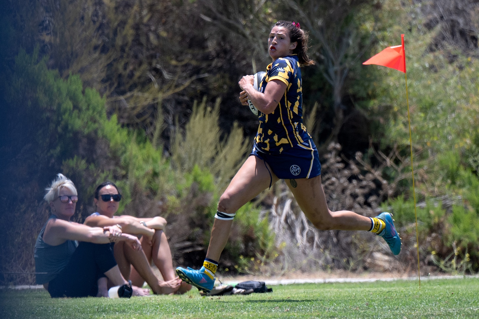 Navy Ensign Megan Neyen breaks away on a scoring run uring the 2024 Armed Forces Women’s Rugby Championships in San Diego, Calif. July 12, 2024. (DoD photo by EJ Hersom)