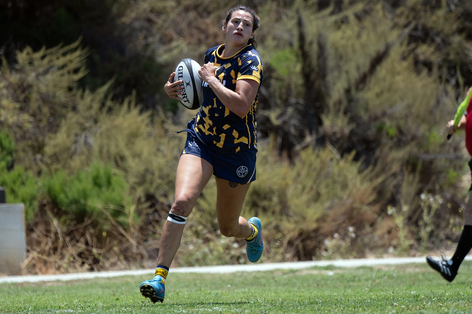 Navy Ensign Megan Neyen crosse the try line during the 2024 Armed Forces Women’s Rugby Championships in San Diego, Calif. July 12, 2024. (DoD photo by EJ Hersom)