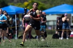 Marine Corps Sgt. Vivian Aragon breaks away on a scoring run during the 2024 Armed Forces Women’s Rugby Championship in San Diego, California, July 12, 2024. (DoD photo by EJ Hersom)