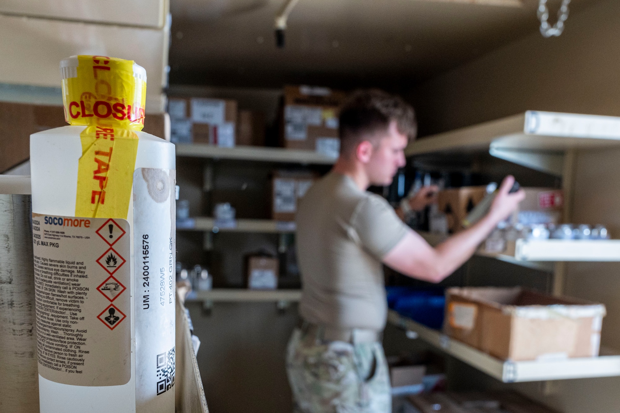 U.S. Air Force Senior Airman Christian Goodwin, 49th Logistics Readiness Squadron HAZMART journeyman, sorts through a series of stored hazardous materials at Holloman Air Force Base, New Mexico, July 18, 2024. The HAZMART section is responsible for shipping and storing a wide range of hazardous materials, ensuring safe delivery to multiple organizations across the base. (U.S. Air Force photo by Senior Airman Isaiah Pedrazzini)