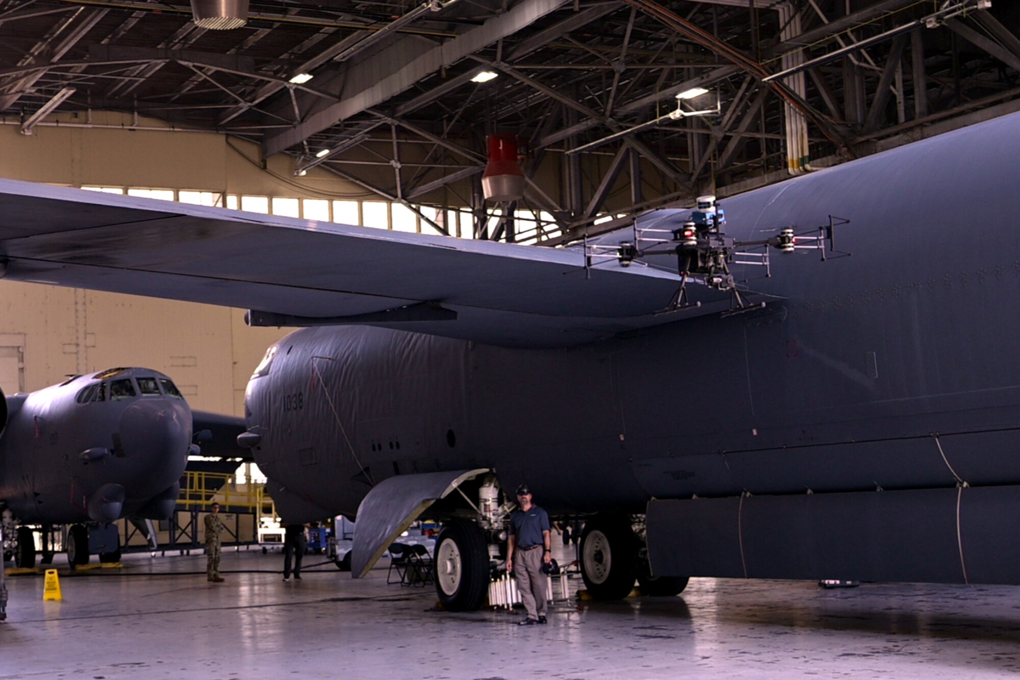 Photo of an unmanned aerial system being flown near a B-52 Stratofortress at Barksdale Air Force Base