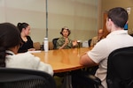 JOINT BASE SAN ANTONO-FORT SAM HOUSTON – (July 23, 2024) – Lt. Anca Selariu (center), a microbiologist assigned to Naval Medical Research Unit (NAMRU) San Antonio, speaks with students participating in the Office of Naval Research’s (ONR) Naval Research Enterprise Internship Program (NREIP) at the Battlefield Health and Trauma Research Institute.  Selariu was part of a four-person crew that took part in the NASA Crew Health and Performance Exploration Analog’s (CHAPEA) first mission. The CHAPEA missions, simulated expeditions to the surface of Mars, aim to collect critical data which will inform future human expeditions to space. Selariu, a native of Romania, brought expertise in vaccines, prion transmission, gene therapy and infectious disease research to the CHAPEA mission. NREIP places college and university students in the Department of the Navy laboratories where they take part in real Naval research for ten weeks during the summer. NREIP gives academically talented college students, graduating seniors, and graduate students pursuing STEM careers the opportunity to learn about Naval research and technology while receiving first-class mentoring by top scientists and engineers. NAMRU San Antonio is one of the leading research and development laboratories for the U.S. Navy under the Department of Defense (DoD) and is one of eight subordinate research commands in the global network of laboratories operating under the Naval Medical Research Command in Silver Spring, Md.  Its mission is to conduct gap driven combat casualty care, craniofacial, and directed energy research to improve survival, operational readiness, and safety of DoD personnel engaged in routine and expeditionary operations. (U.S. Navy photo by Burrell Parmer, NAMRU San Antonio Public Affairs/Released)