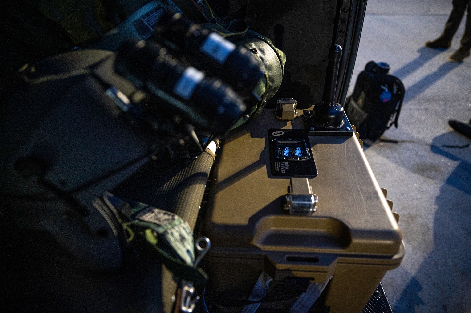 A light box being loaded onto an aircraft.