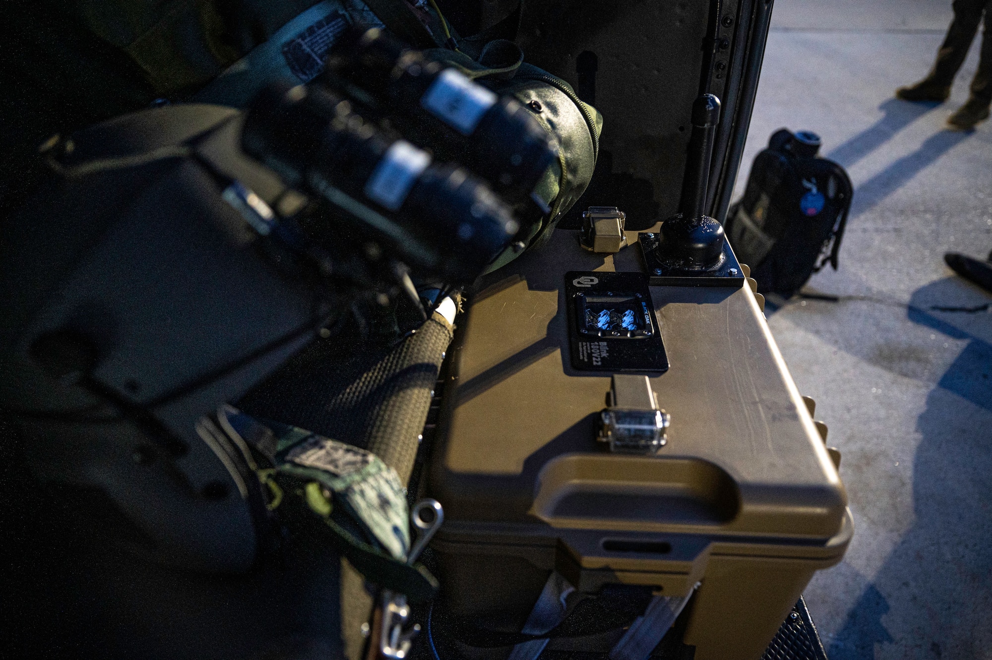A light box being loaded onto an aircraft.