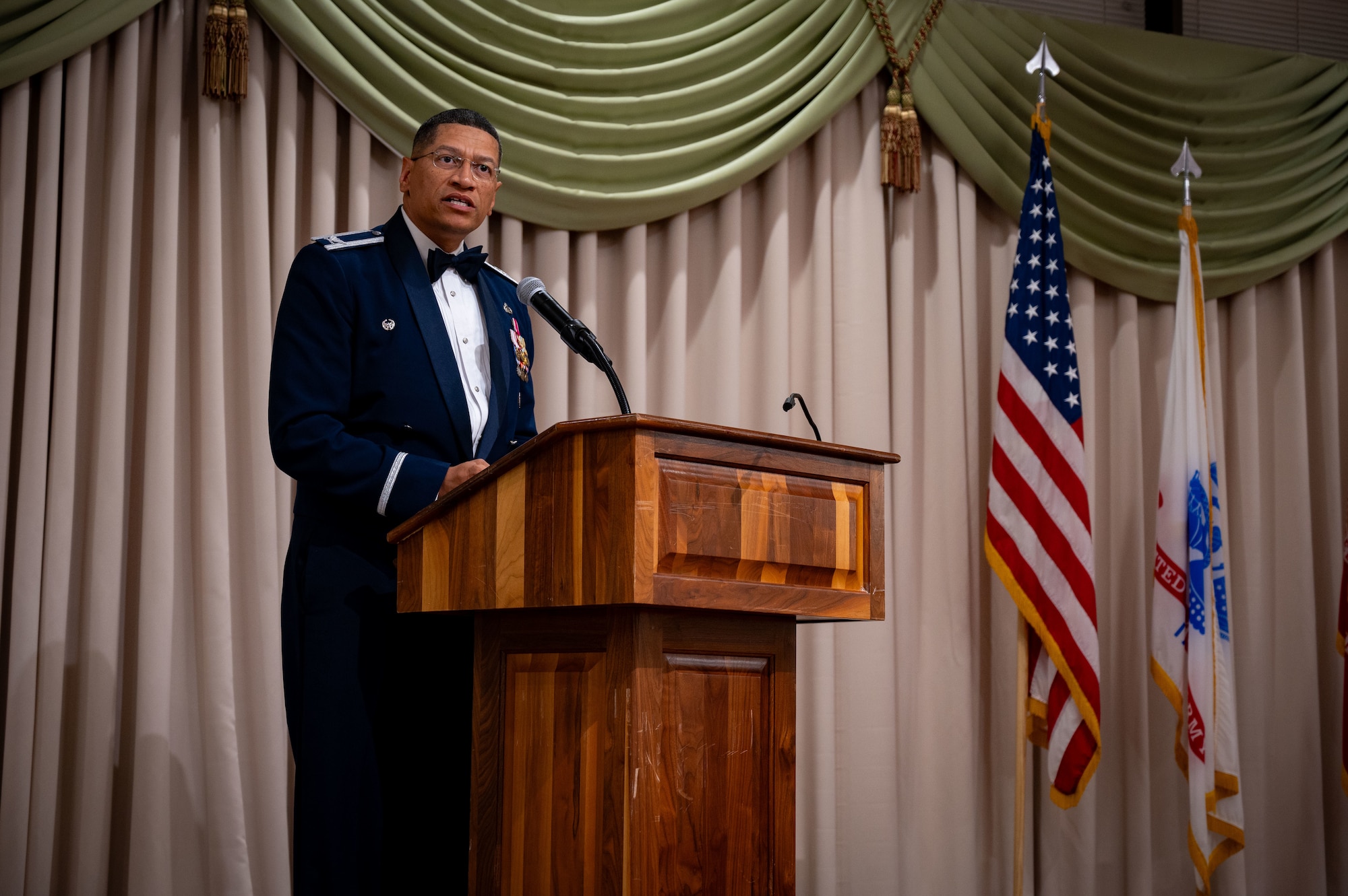 U.S. Air Force Col. Anthony L. Smith, Joint Base McGuire-Dix-Lakehurst commander and 87th Air Base Wing commander, gives remarks during a Senior Noncommissioned Officer Induction ceremony at Joint Base McGuire-Dix-Lakehurst, N.J., July 19, 2024. The ceremony is a traditional rite of passage used by SNCOs to convey the special pride felt when newly promoted sergeants enter the highest echelon of the NCO corps. (U.S. Air Force photo by 2nd Lt. Alexis Kula)