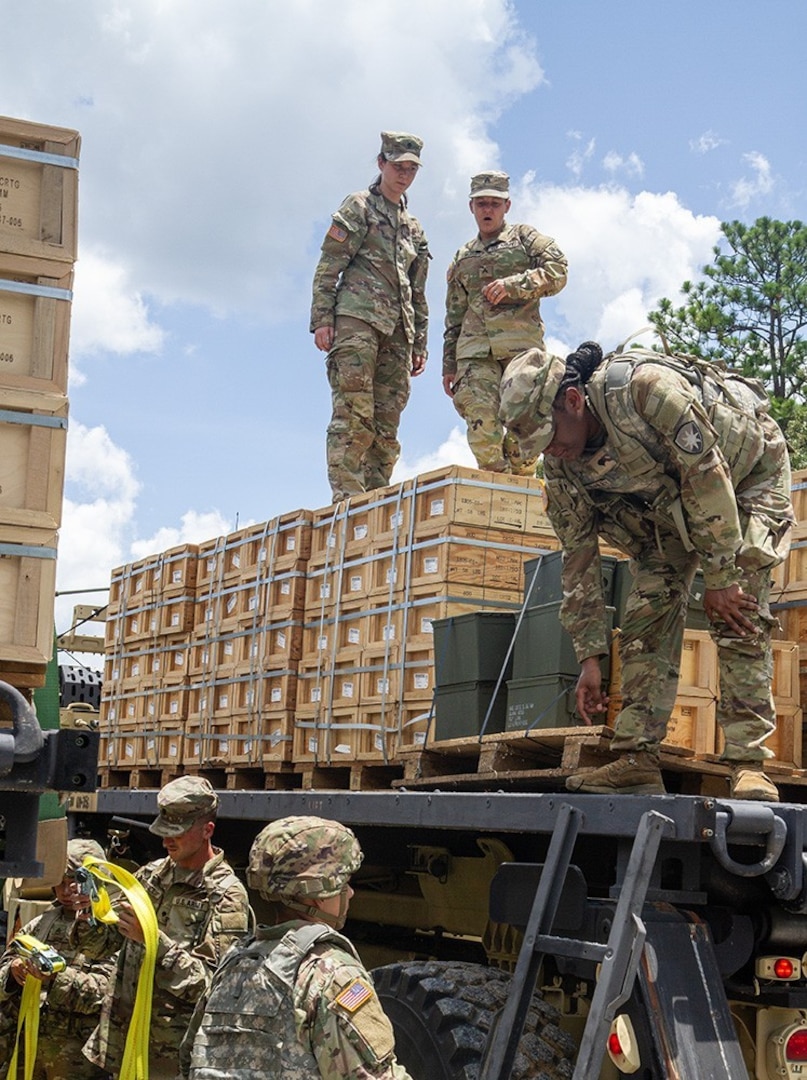 Soldiers assigned to the 53rd Brigade Support Battalion prepared to unload ammunition they have just transported from an ammunition supply point to an ammunition holding area at Camp Shelby, Mississippi, July 15, 2024. These Soldiers are among almost 5,000 Florida Army National Guard Soldiers mobilized to Camp Shelby to support the eXportable Combat Training Capability exercise, a major training event that ensures the 53rd Infantry Brigade Combat Team’s readiness and proficiency to deploy