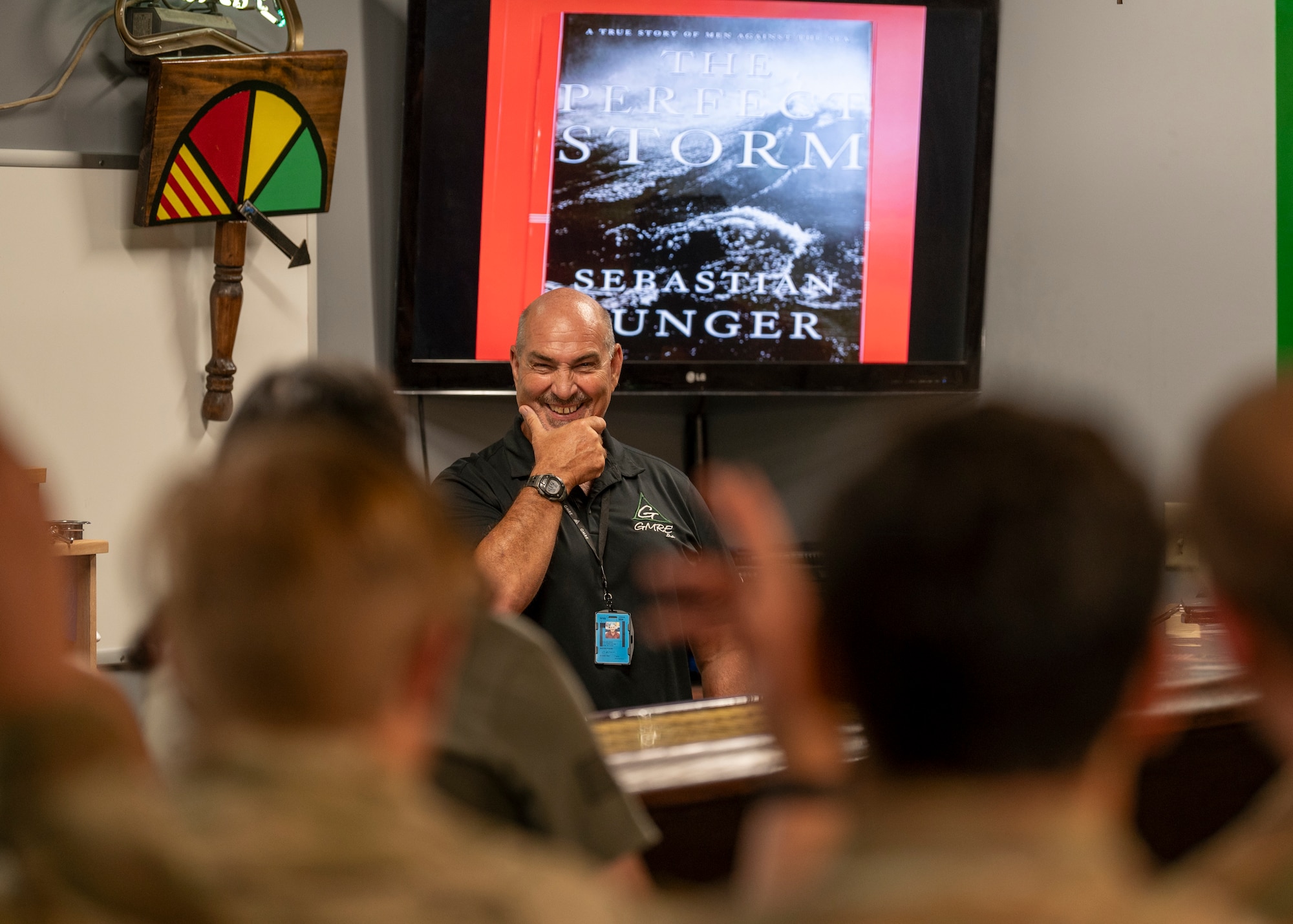 Mr. Dave Rivola, the real-life inspiration for the film ”The Perfect Storm” gives a mission brief to Airmen at Moody Air Force Base, Georgia, July 23, 2024. Rivola is a retired U.S. Air Force Lt. Col. and was the helicopter pilot of Air Force Rescue 110 that was characterized in the movie “The Perfect Storm”. (U.S. Air Force photo by Senior Airman Leonid Soubbotine)