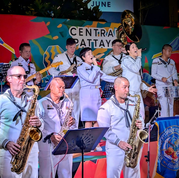 Musician 3rd Class Marisol Arreola, right, assigned to U.S. 7th Fleet Band, and Royal Thai Navy Chief Petty Officer 1st Class Nutjareeya Sangaree, assigned to Royal Thai Navy ACDC Band sing together during a joint performance at Central Pattaya Mall as part of Cooperation Afloat Readiness and Training (CARAT) Thailand 2024 in Sattahip, Thailand, July 21, 2024.