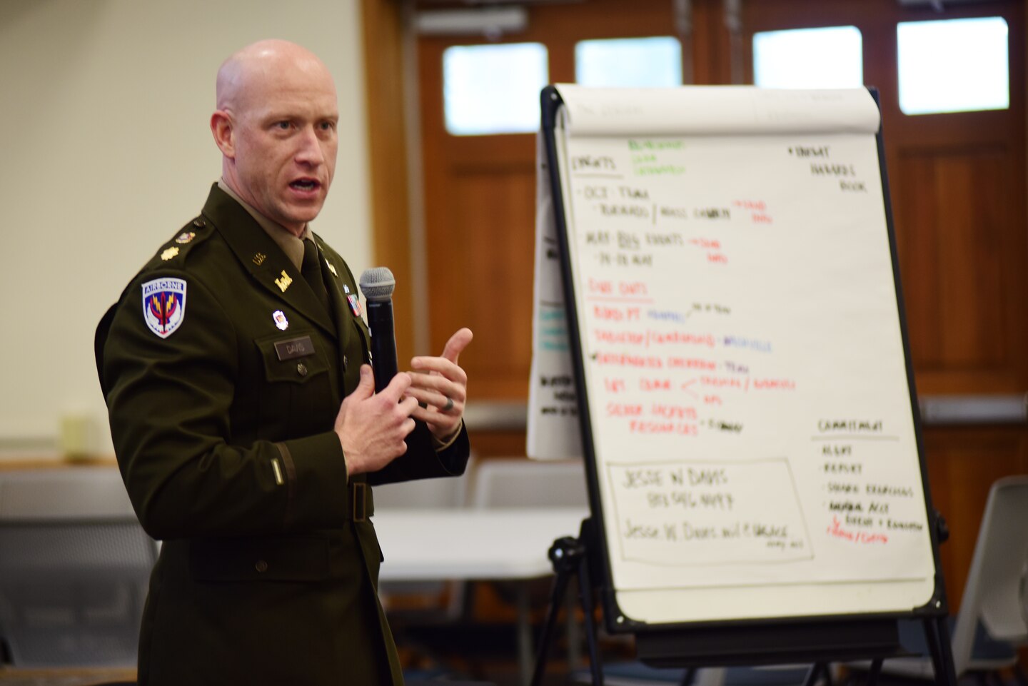 Maj. Jesse Davis, U.S. Army Corps of Engineers Nashville District deputy commander, reports on the discussions and due outs achieved from an emergency response breakout session July 24, 2024, during the Tennessee Partnering Meeting at Ellington Agriculture Center in Nashville, Tennessee. (USACE Photo by Leon Roberts)