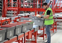 An employee at the U.S. Army Medical Materiel Center-Europe sorts medical supply items May 29, 2024, in the center's distribution warehouse at Kaiserslautern Army Depot, Germany. (C.J. Lovelace)