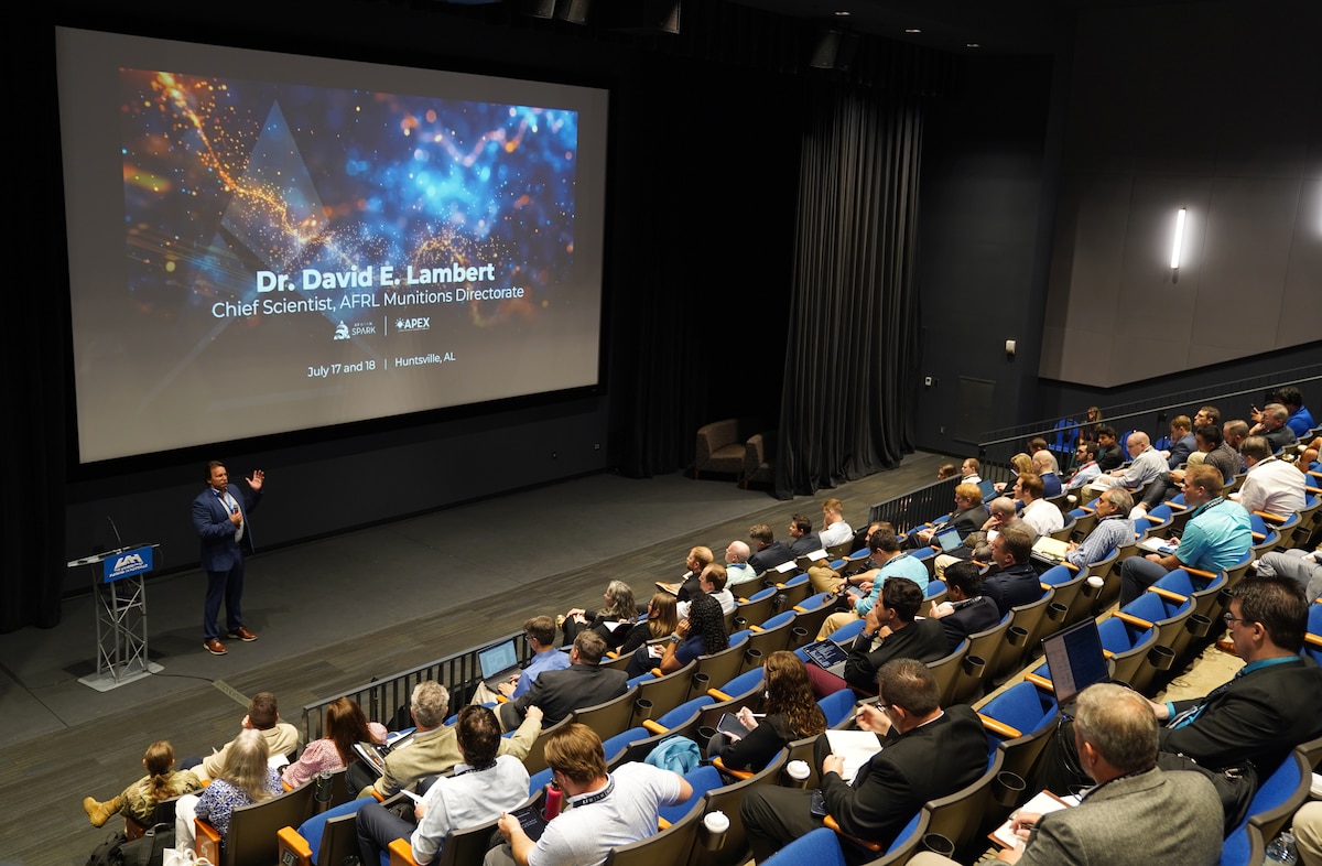 Dr. David Lambert, Air Force Research Laboratory Munitions Directorate chief scientist, briefs the audience at the AFWERX Collider event aimed at exploring commercial solutions for software-enabled weapons at the University of Alabama in Huntsville, July 17-18, 2024.