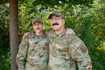 Tech. Sgt. Mason Young, 134th Communications Squadron cyber network systems operations craftsman, and U.S. Space Force Sgt. Jared Dreier, U.S. Space Forces Europe and Africa Component Command Headquarters space systems operator, pose for a photo at Ramstein Air Base, Germany, July 18, 2024. Young and Dreier are brothers with a long family lineage of military service.