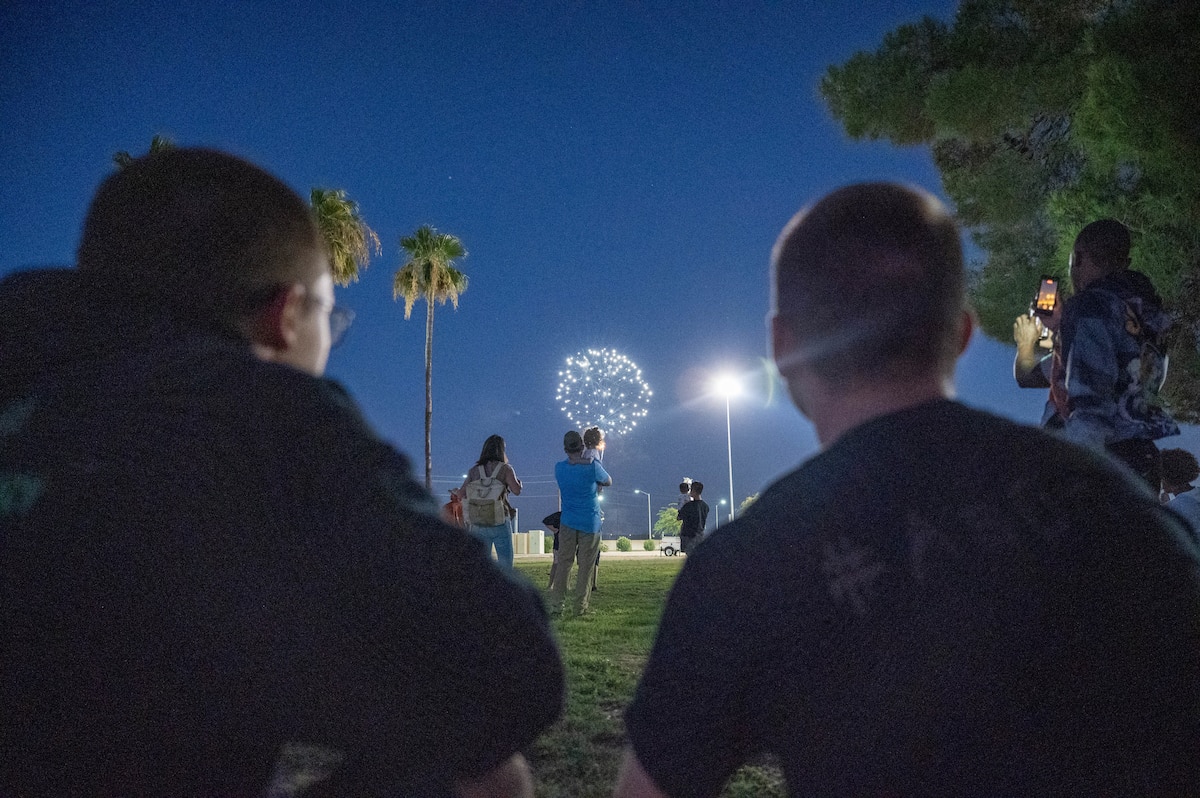 Luke Air Force Base community members watch a fireworks show during the 2024 Freedom Fest, July 3, 2024, at Luke AFB, Arizona.
