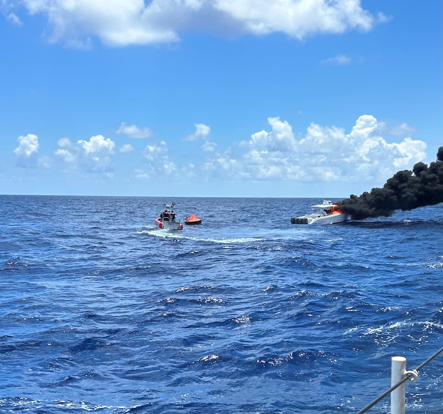 The Coast Guard Cutter Bernard C. Webber arriving on the scene of a burning 42-foot cabin cruiser near Dania Beach, Florida, July 25, 2024. Coast Guard and Broward Fire Rescue boat crews rescued two people with no medical concerns before extinguishing the flames.