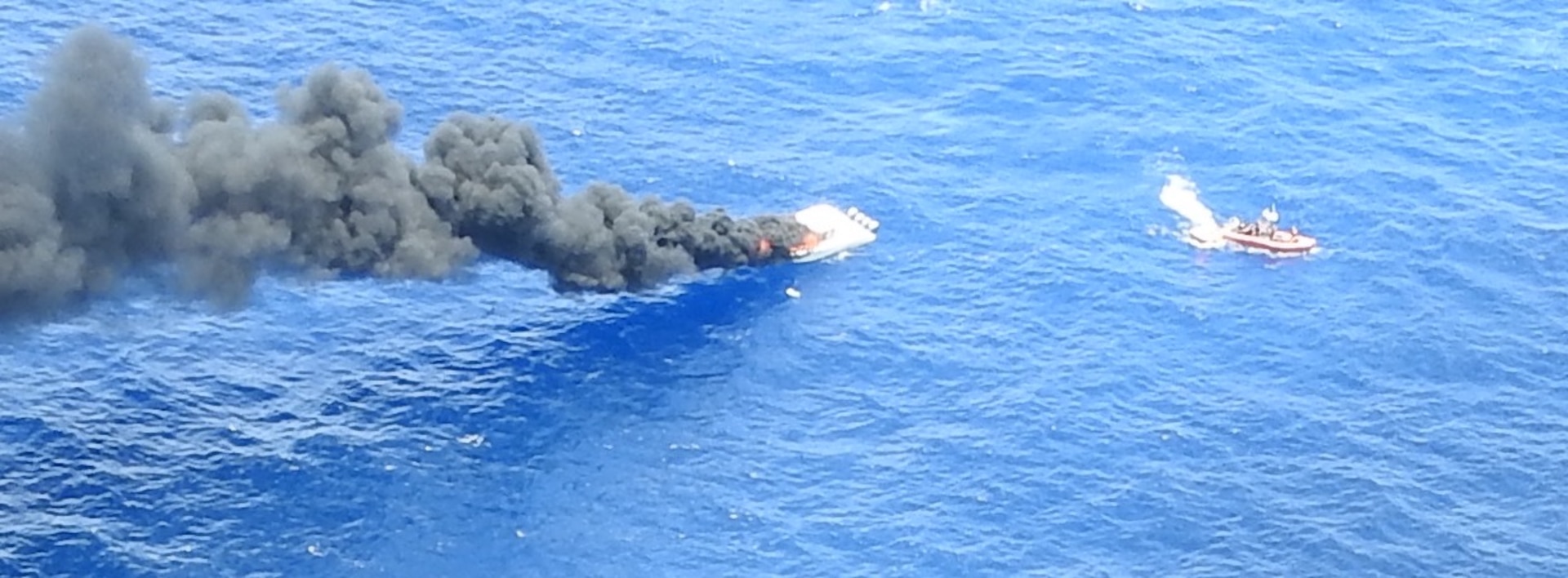 Coast Guard and Broward Country Fire rescue respond to burning vessel near Dania Beach.
