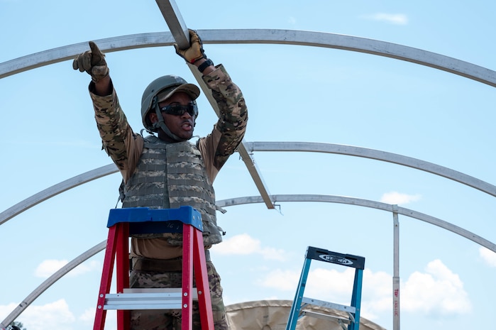 An Airman takes down a tent