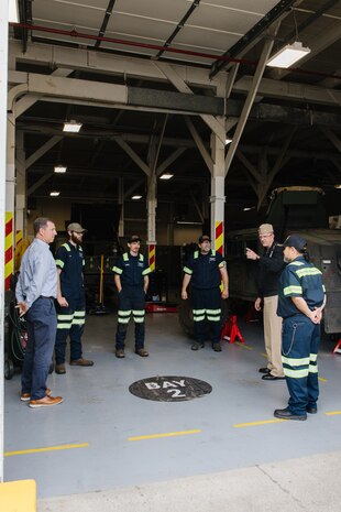 SILVERDALE, Wash. (July 22, 2024) - Strategic Systems Programs (SSP) Director Vice Adm. Johnny Wolfe Jr., (next to right) visits with staff from Strategic Weapons Facility Pacific (SWFPAC) and contractor staff from industry partner Skookum Contract Services at Naval Base Kitsap-Bangor. Through close collaboration with industry, SWFPAC executed critical updates to its fleet of armed fighting vehicles specifically high mobility multipurpose wheeled vehicles (HMMWVs) that provide security for our nation's strategic assets. This work—accomplished in tandem with this partnership—validated the need to address shortfalls for the HMMWVs and doubled the number of safe and operable vehicles available for the security mission with a sense of urgency. SWFPAC's work with partners to improve operational readiness in support of its security mission ensures greater surety for the nation's nuclear deterrence mission. SWFPAC—SSP’s naval shore facility in the Pacific—assembles and deploys Trident II D5 missiles aboard Fleet Ballistic Missile submarines (SSBNs) while safeguarding the nation’s strategic assets. SSP is the Navy command that provides cradle-to-grave lifecycle support for the sea-based leg of the nation’s nuclear triad. This includes training, systems, equipment, facilities and personnel responsible for ensuring the safety, security, and effectiveness of the nation’s Submarine Launched Ballistic Missile (SLBM) Trident II (D5LE) Strategic Weapon System. (Photo Courtesy: Skookum)