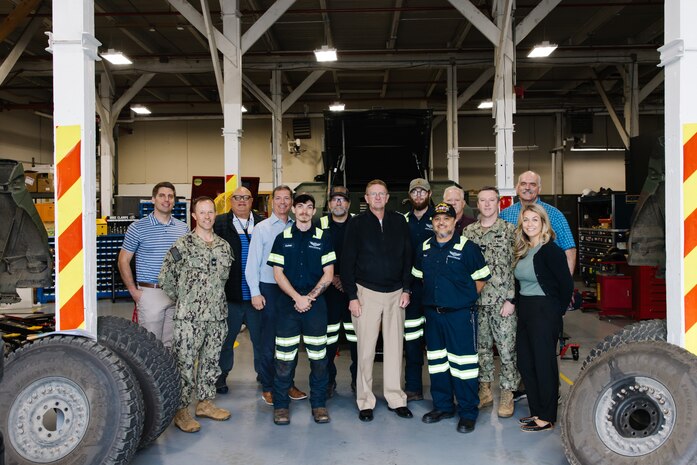 SILVERDALE, Wash. (July 22, 2024) - Strategic Systems Programs (SSP) Director Vice Adm. Johnny Wolfe Jr., (right of center) visits with Strategic Weapons Facility Pacific (SWFPAC) Commander Capt. Keith Fahlenkamp (front left), staff from SWFPAC, and contractor staff from Skookum Contract Services at Naval Base Kitsap-Bangor. Through close collaboration with industry, SWFPAC executed critical updates to its fleet of armed fighting vehicles specifically high mobility multipurpose wheeled vehicles (HMMWVs) that provide security for our nation's strategic assets. This work—accomplished in tandem with this partnership—validated the need to address shortfalls for the HMMWVs and doubled the number of safe and operable vehicles available for the security mission with a sense of urgency. SWFPAC's work with partners to improve operational readiness in support of its security mission ensures greater surety for the nation's nuclear deterrence mission. SWFPAC—SSP’s naval shore facility in the Pacific—assembles and deploys Trident II D5 missiles aboard Fleet Ballistic Missile submarines (SSBNs) while safeguarding the nation’s strategic assets. SSP is the Navy command that provides cradle-to-grave lifecycle support for the sea-based leg of the nation’s nuclear triad. This includes training, systems, equipment, facilities and personnel responsible for ensuring the safety, security, and effectiveness of the nation’s Submarine Launched Ballistic Missile (SLBM) Trident II (D5LE) Strategic Weapon System. (Photo Courtesy: Skookum)