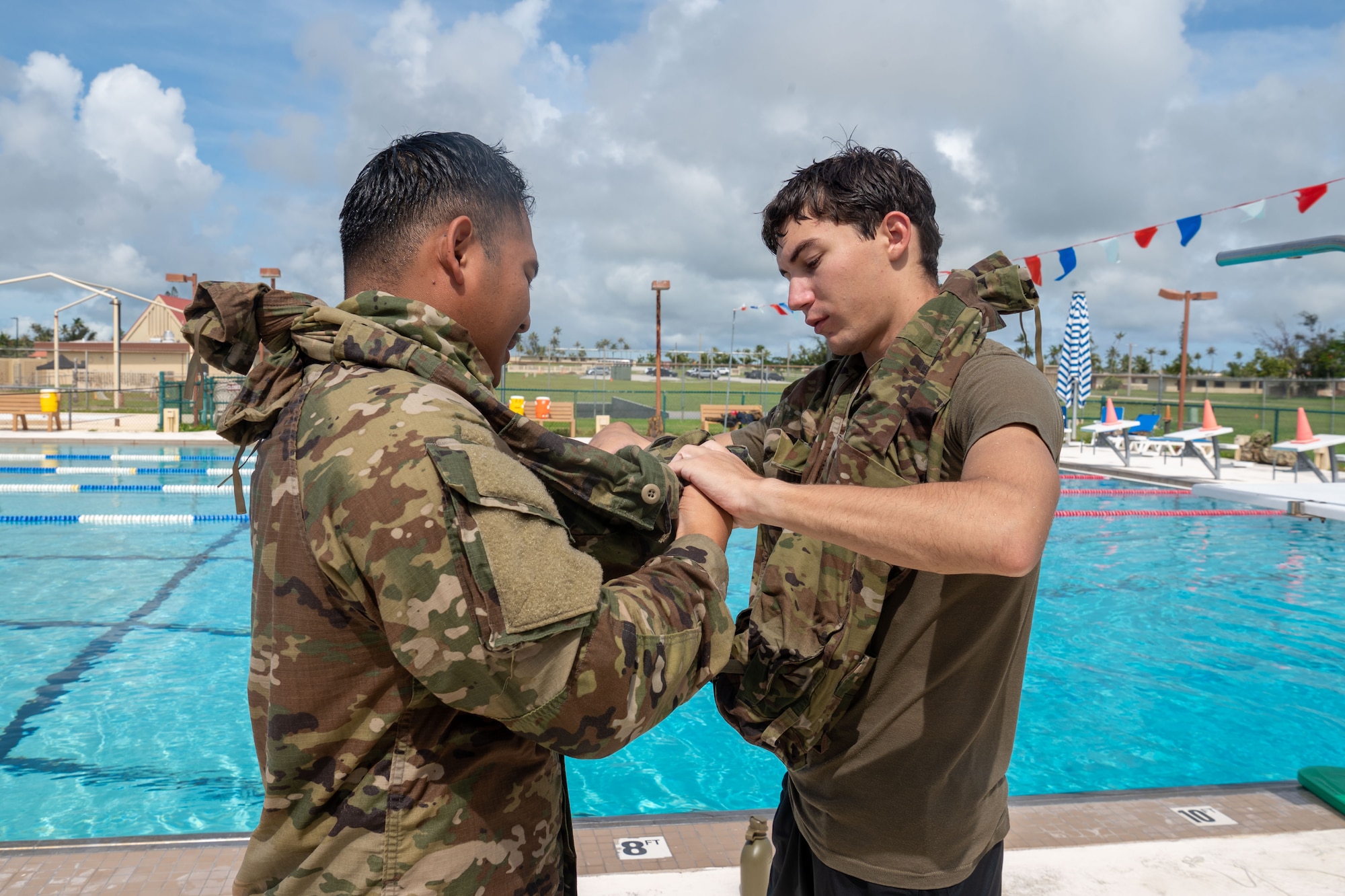 736th Security Forces Squadron Airmen participate in water confidence training on Andersen Air Force Base, Guam, July 24, 2024. In the latter weeks of July the 736th SFS participated in a Jungle Training Course aimed to enhance ground force capabilities in a jungle environment. They learned different survival skills such as water confidence, water purification, trap making, evasion tactics and other skills useful in jungle warfare. (U.S. Air Force photo by Airman 1st Class Audree Campbell)
