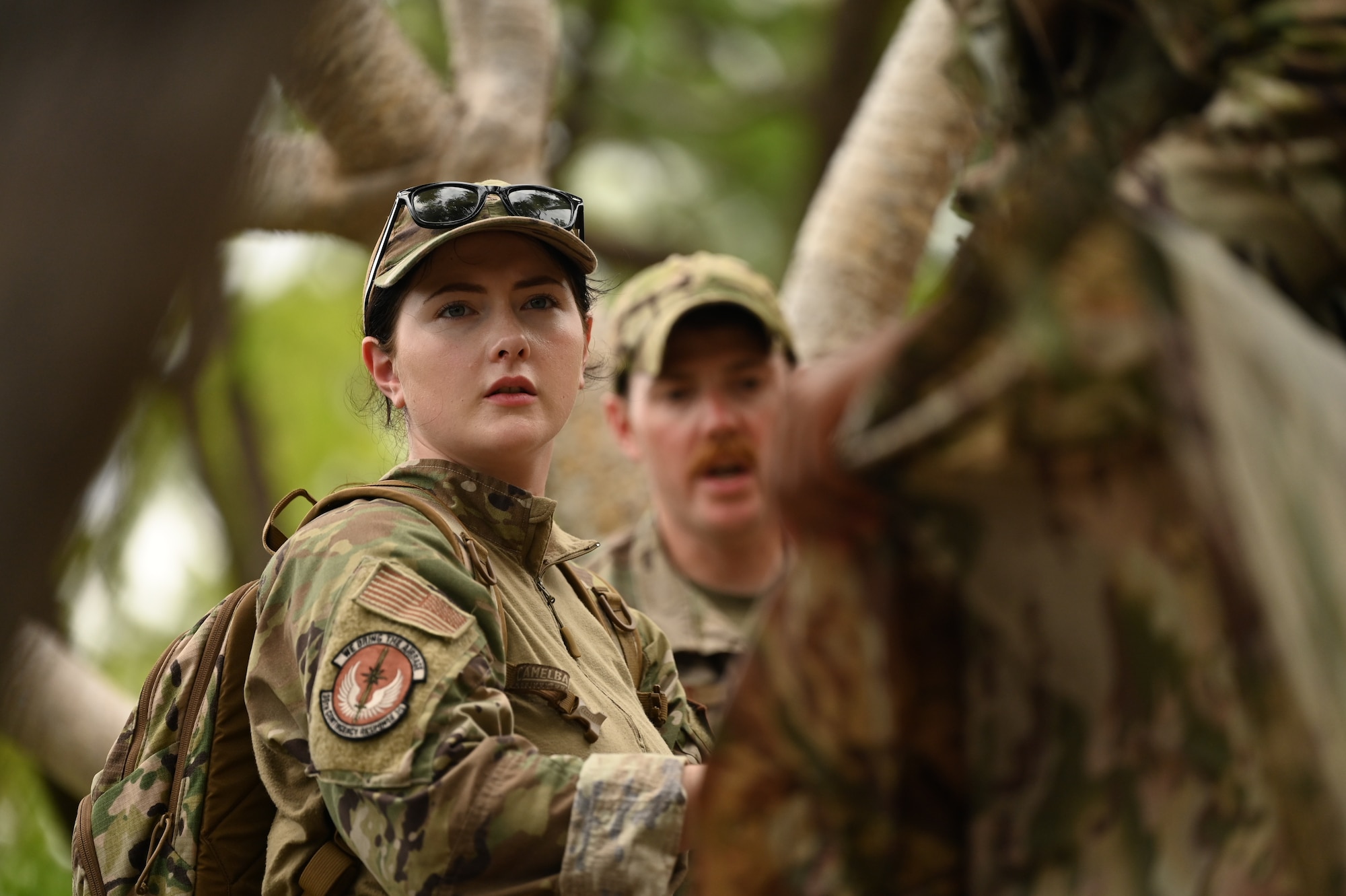 736th Security Forces Squadron Airmen participate in a Jungle Training Course on Andersen Air Force Base, Guam, July 25, 2024. In the latter weeks of July the 736th SFS participated in a Jungle Training Course aimed to enhance ground force capabilities in a jungle environment. They learned different survival skills such as water confidence, water purification, trap making, evasion tactics and other skills useful in jungle warfare. (U.S. Air Force photo by Airman 1st Class Audree Campbell)