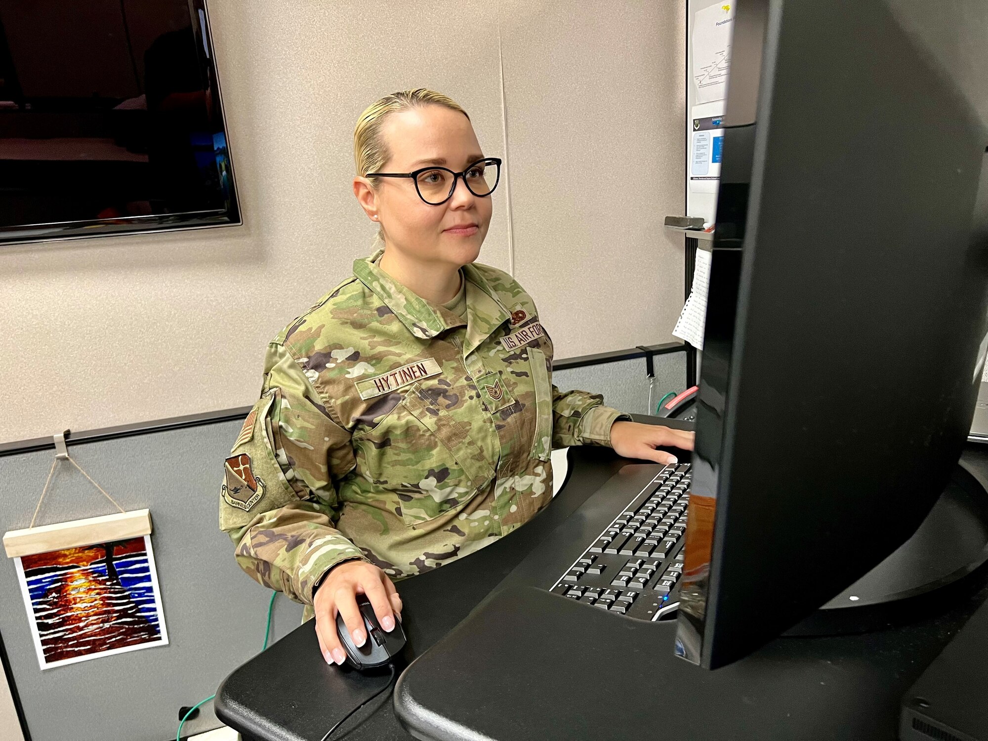 Tech. Sgt. Kate Hytinen, Barnes Center Foundations noncommissioned officer in charge, reviews Foundations curriculum at the Thomas N. Barnes Center for Enlisted Education, July 25, 2024. Foundations curriculum achieved full operational capability July 19, 2024, after nine months of course testing and training. (U.S. Air Force photo/Brian Ferguson)