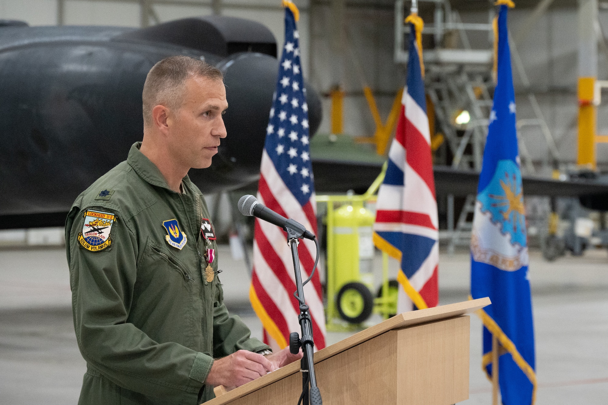 U.S. Air Force Lt. Col. Jonathan D. Young, 99th Expeditionary Reconnaissance Squadron outgoing commander gives a speech during a change of command ceremony.