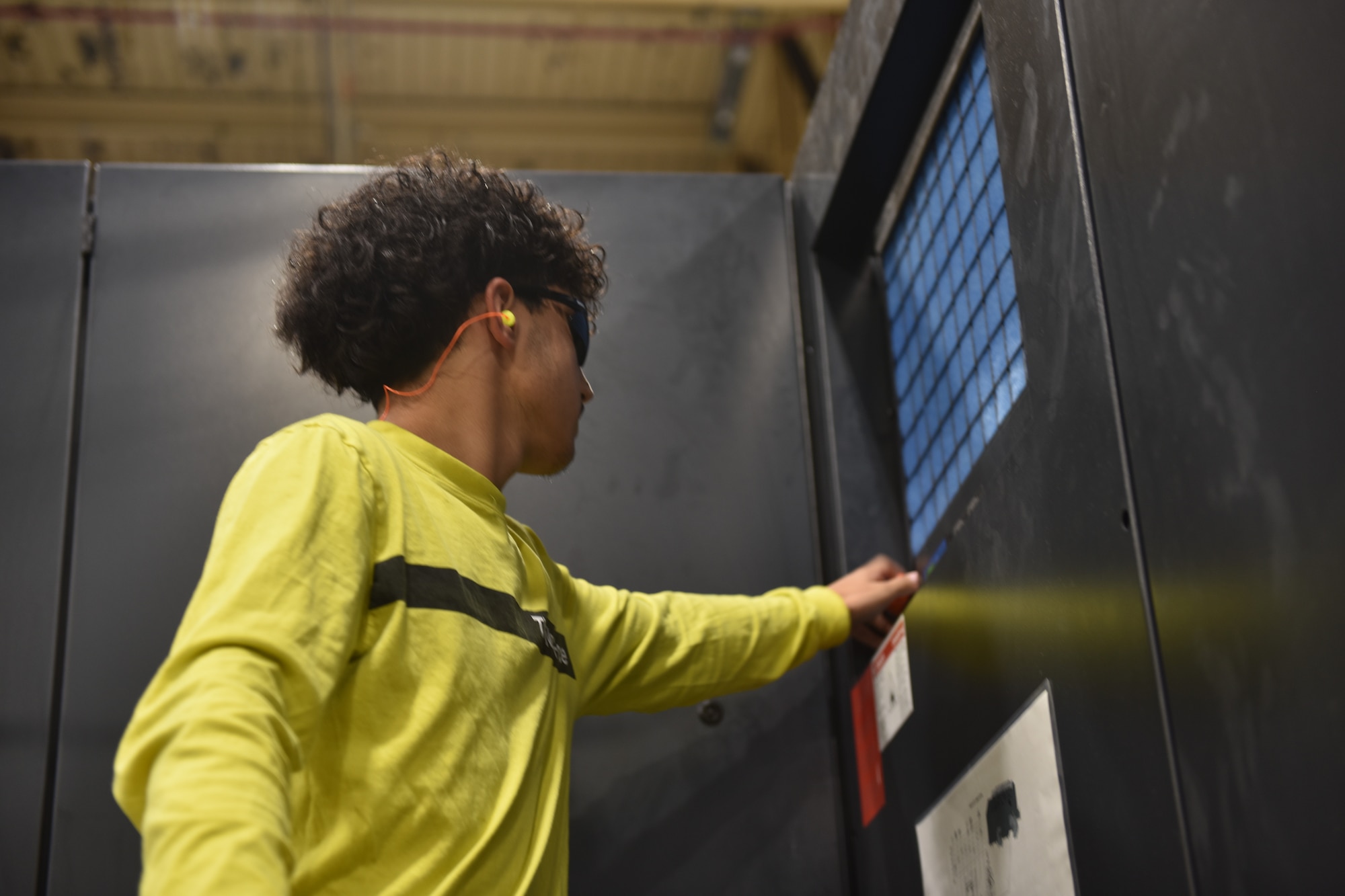Man touching a computer server