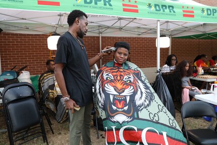 The District of Columbia National Guard Counterdrug Program partners with the Metropolitan Police Department and DC Department of Parks and Recreation for "Beat the Streets/Late Night Hype" in northwest Washington, D.C., July 19, 2024. The summer outreach initiative improves community relations and supports the city’s goal toward reducing substance abuse and illicit drug activities across all wards through outreach.