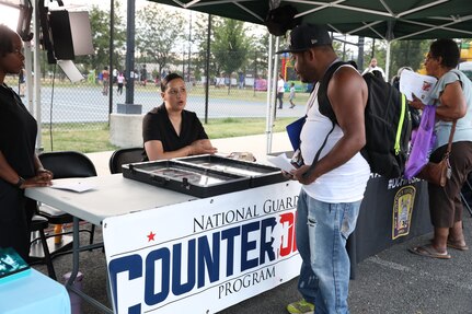 The District of Columbia National Guard Counterdrug Program partners with the Metropolitan Police Department and DC Department of Parks and Recreation for "Beat the Streets/Late Night Hype" in northwest Washington, D.C., July 19, 2024. The summer outreach initiative improves community relations and supports the city’s goal toward reducing substance abuse and illicit drug activities across all wards through outreach.