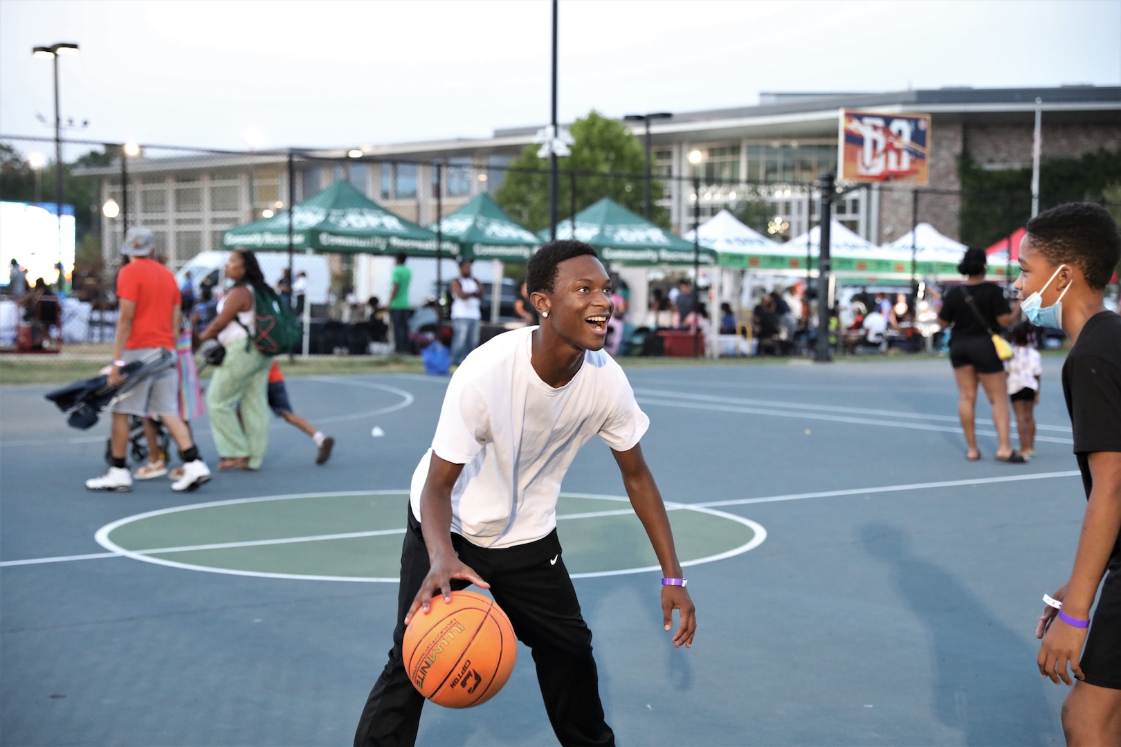 The District of Columbia National Guard Counterdrug Program partners with the Metropolitan Police Department and DC Department of Parks and Recreation for "Beat the Streets/Late Night Hype" in northwest Washington, D.C., July 19, 2024. The summer outreach initiative improves community relations and supports the city’s goal toward reducing substance abuse and illicit drug activities across all wards through outreach.