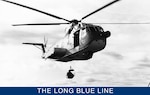 A vintage photo of a Coast Guard HH-3F “Pelican” making a hoist at sea. (Courtesy of the U.S. Coast Guard Aviation association)