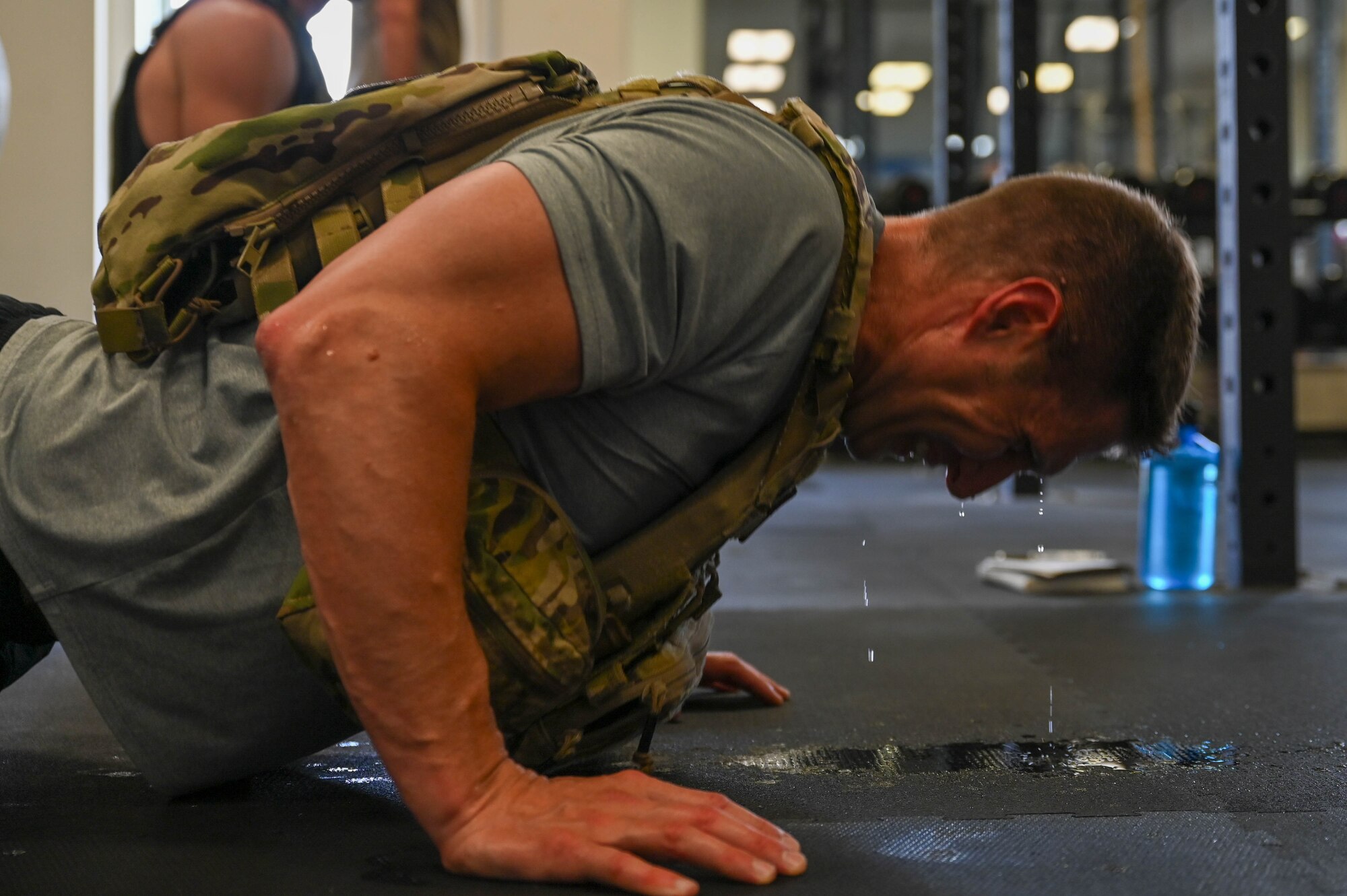 U.S. Air Force Major Erik M Minshall, officer for the 178th Security Forces Squadron completes push-ups for the Murph Challenge, May 8, 2024, on Springfield-Beckley Air National Guard Base, Ohio. The challenge consisted of a one-mile run, 100 pull-ups, 200 push-ups, 300 air squats, and another one-mile run, held annually close to Memorial Day in memory of Navy Lt. Michael Murphy, a posthumous Medal of Honor recipient. (U.S. Air National Guard photo by Airman 1st Class Josh Kaeser)