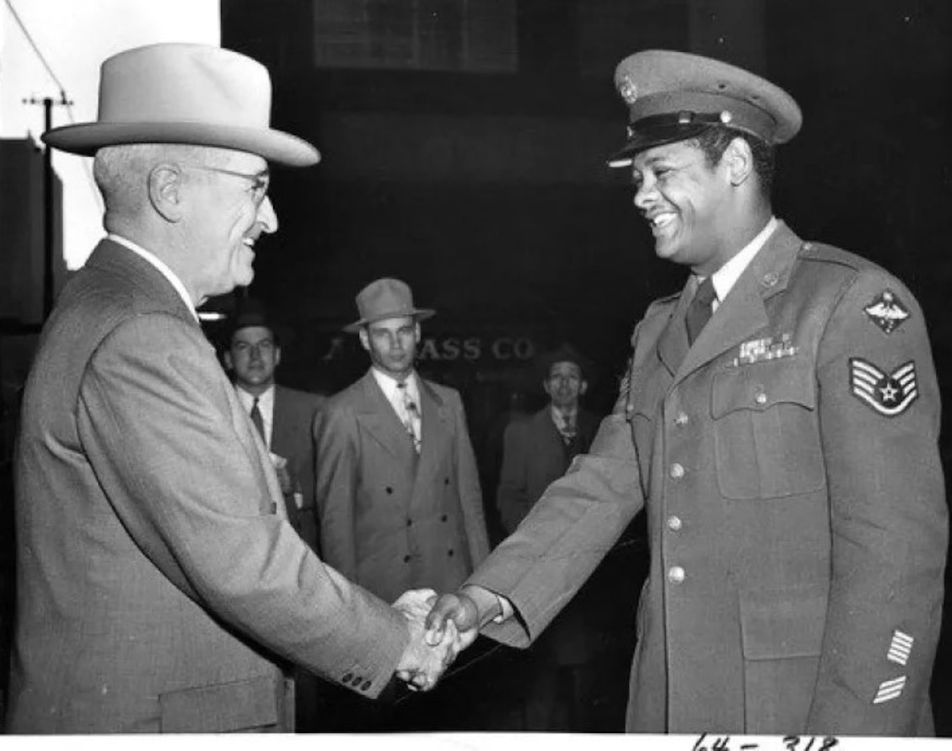 President Harry S. Truman shakes hands with U.S. Air Force Staff Sgt. Edward Williams on Oct. 13, 1950. Truman signed the executive order integrating the U.S. armed forces on July 26, 1948.