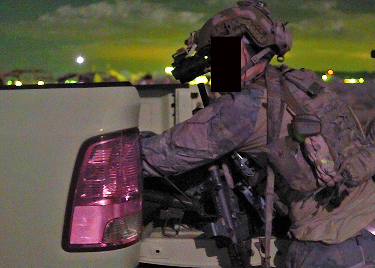 A U.S. Air Force Special Warfare Team-3 member, assigned to the 48th Rescue Squadron conducts patient care during a training scenario at the Barry M. Goldwater Range, Gila Bend, Ariz., July 19, 2024. SWT-3 is an experimental and evolving team designed around capability requirements in the Air Force’s Special Warfare 2.0 new construct. (U.S. Air Force photo by Staff Sgt. Abbey Rieves) (This photo has been altered for security purposes by blacking out facial identification.)