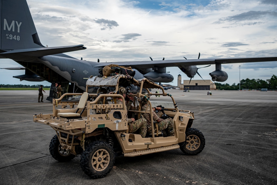 U.S. Air Force Airmen assigned to 38th Rescue Squadron drive on the flightline at Moody Air Force Base, Georgia, July 24, 2024. The ability to rapidly deploy, render aid and quickly return allows 38th RQS Airmen to be able to come to the aid of the U.S. and allied forces. (U.S. Air Force photo by Senior Airman Leonid Soubbotine)