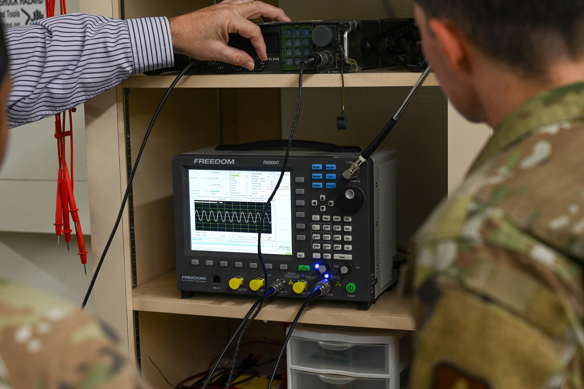 Edward Hilton, 338th Training Squadron Radio Frequency Transmissions Systems instructor, demonstrates how to interpret frequencies at Keesler Air Force Base, Mississippi, July 22, 2024.