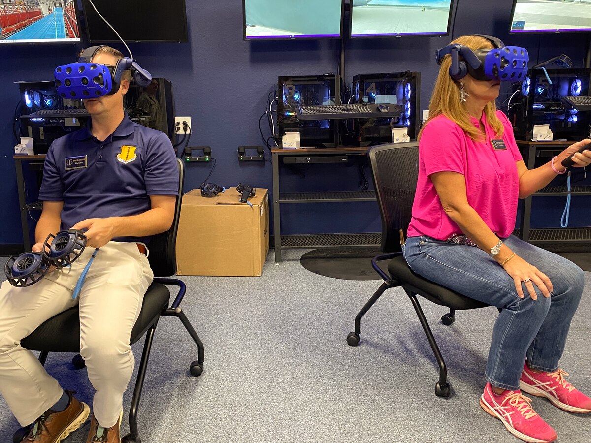 Goodfellow Air Force Base honorary commanders engage in virtual reality training at Dyess Air Force Base, Texas July 24, 2024. The 317th Airlift Wing built a revolutionary VR lab from the ground up as a solution to multiple problems. May it be weather, flight schedules, or other logistical factors, training has not always been available at a moment’s notice until now. (U.S. Air Force photo by 2nd Lt. Harris Hillstead)