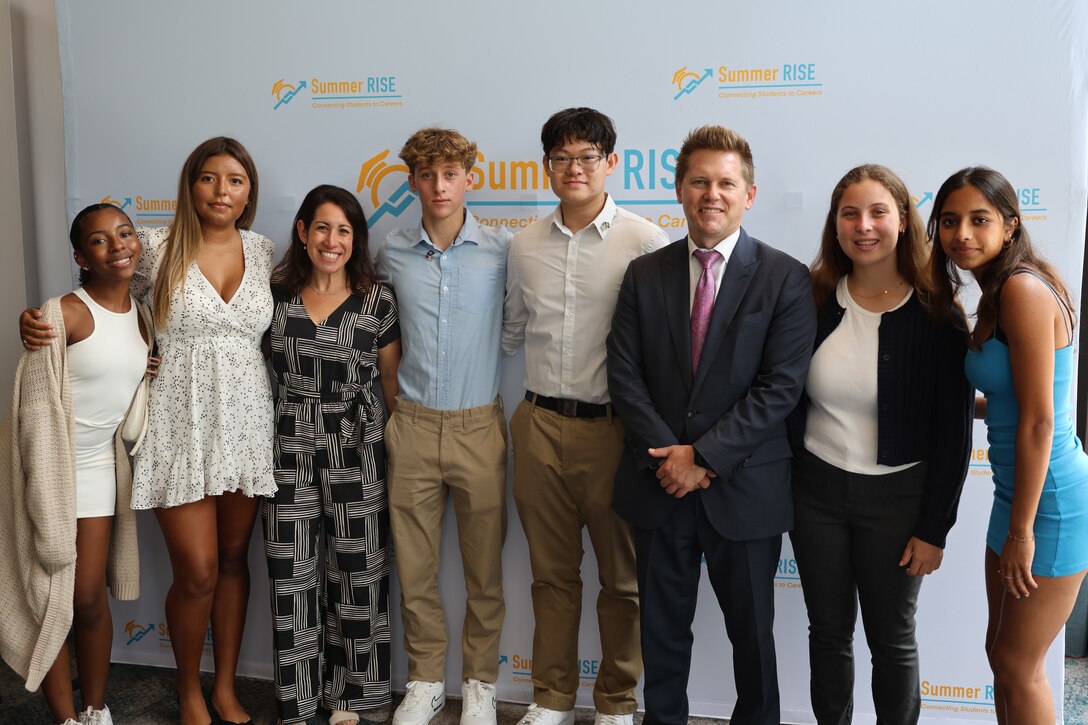 Carderock’s Interns from Montgomery County Public Schools’ Summer RISE Program and Branch Head of Public Affairs and Congressional Affairs Ian McConnaughey, stand for a group photo at the program’s closing ceremony at the Bethesda North Marriott Hotel and Conference Center in Rockville, Md., July 25, 2024.