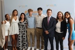 Carderock’s Interns from Montgomery County Public Schools’ Summer RISE Program and Branch Head of Public Affairs and Congressional Affairs Ian McConnaughey, stand for a group photo at the program’s closing ceremony at the Bethesda North Marriott Hotel and Conference Center in Rockville, Md., July 25, 2024. The students came from different schools in Montgomery County Public Schools District and worked at Naval Surface Warfare Center, Carderock Division for five weeks with various codes in their career area of interest. Carderock is one of the Navy’s pre-eminent research and development facilities that specializes in critical ship design components headquartered in West Bethesda, Maryland. The Carderock Division supports small-scale model testing and evaluation of next-generation surface ships and underwater vessels
