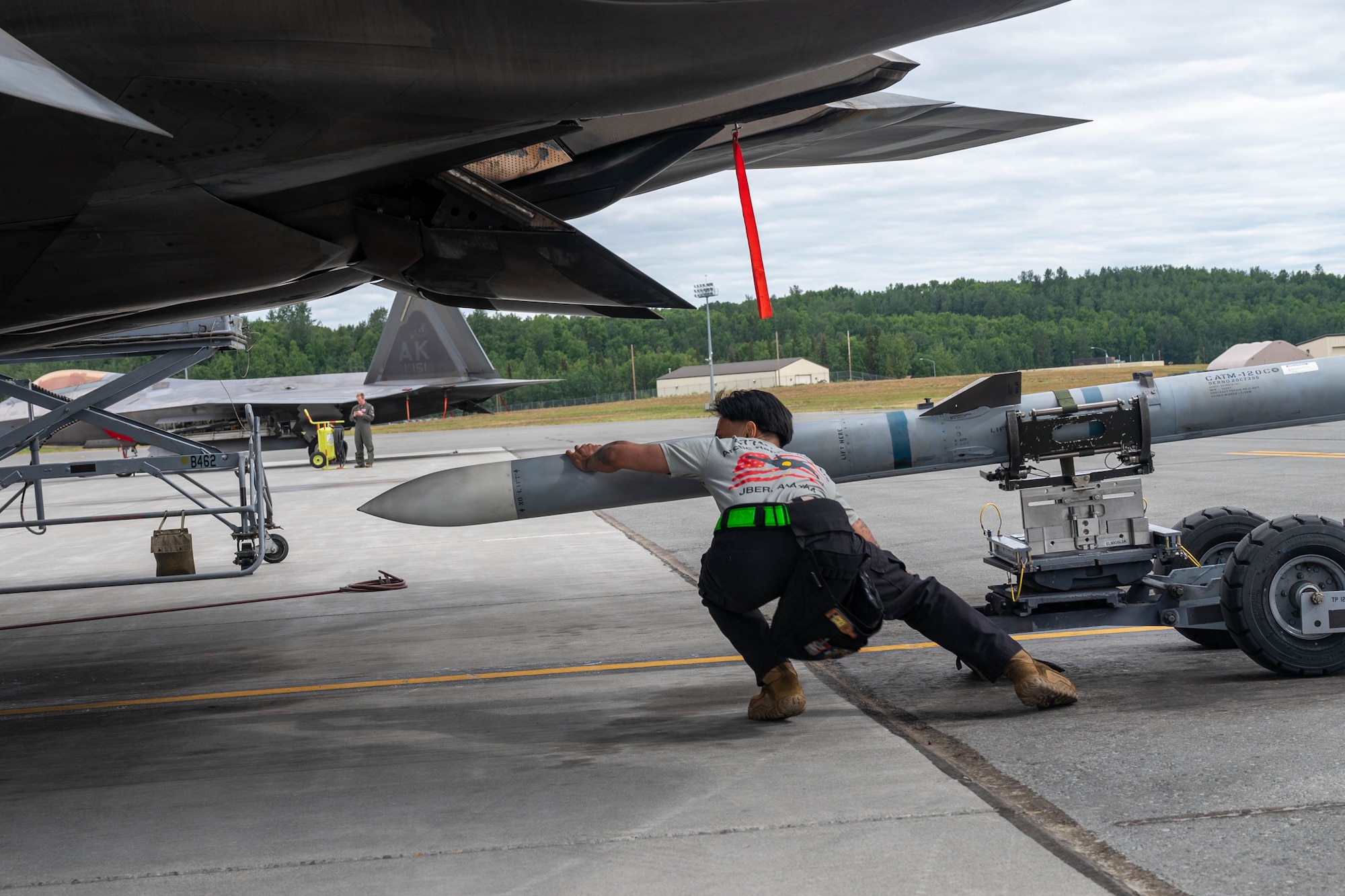 On July 12, 2024, spectators witnessed Joint Base Elmendorf-Richardson’s first live regeneration-style competition. Ammo crews prepared world-class munitions, crew chiefs quick-turned four F-22 raptors, and four weapons load crews threw down in a head-to-head weapons load competition.