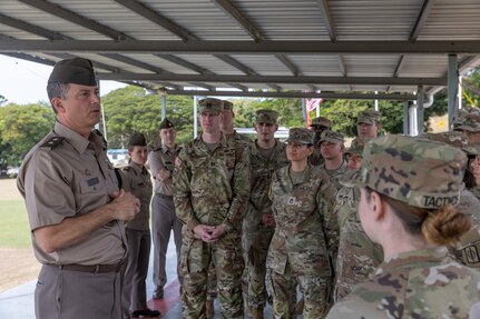 U.S. Army Maj. Gen. Gavin Gardner, left, the commanding general of the 8th Theater Sustainment Command, talks to U.S. Army Soldiers assigned to U.S. Army Pacific after the closing ceremony for Tamiok Strike 2024 at Murray Barracks, Papua New Guinea, July 26, 2024.