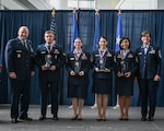 From left: U.S. Air Force Gen. Duke Pirak, acting director, Air National Guard; Senior Airman Gavin Woken,  121st Air Refueling Wing, Ohio National Guard; Master Sgt. Haley Rankin of the Western Air Defense Sector, Washington Air National Guard; Senior Master Sgt. Alejandra Rosales,  195th Wing, California Air National Guard; Master Sgt. Diana Nogiec, 110th Wing, Michigan National Guard; and Chief Master Sgt. Lisa Perry, interim command chief, Air National Guard pose for a group photo during the culmination of the Outstanding Airmen of the Year awards ceremony at the Air National Guard Readiness Center, Joint Base Andrews, Maryland, July 26, 2024.