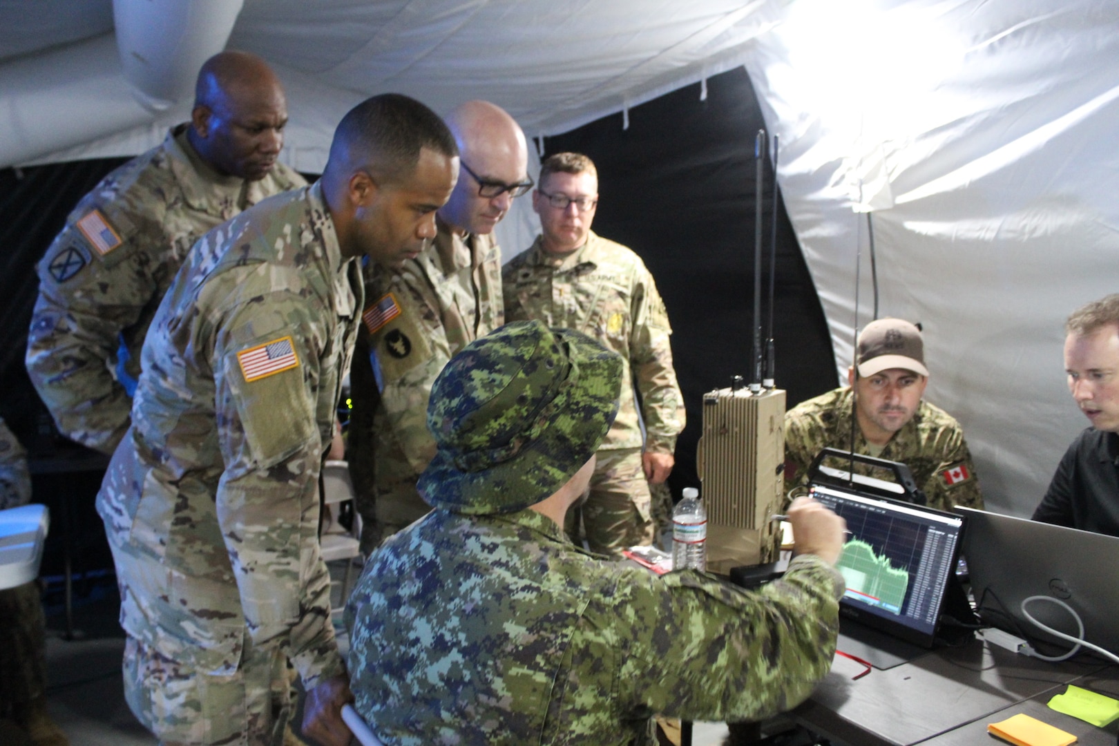 Soldiers from the U.S. Army, the 75th U.S. Army Reserve Innovation Command and various nations gathered to gain information during Cyber Quest 24 on July 17, 2024, at Fort Eisenhower, Ga. Cyber Quest 24 brought together Soldiers, industry partners, and government agencies to evaluate cutting-edge technologies that will shape the future battlefield. (U.S. Army photo by Lesli Ellis-Wouters)