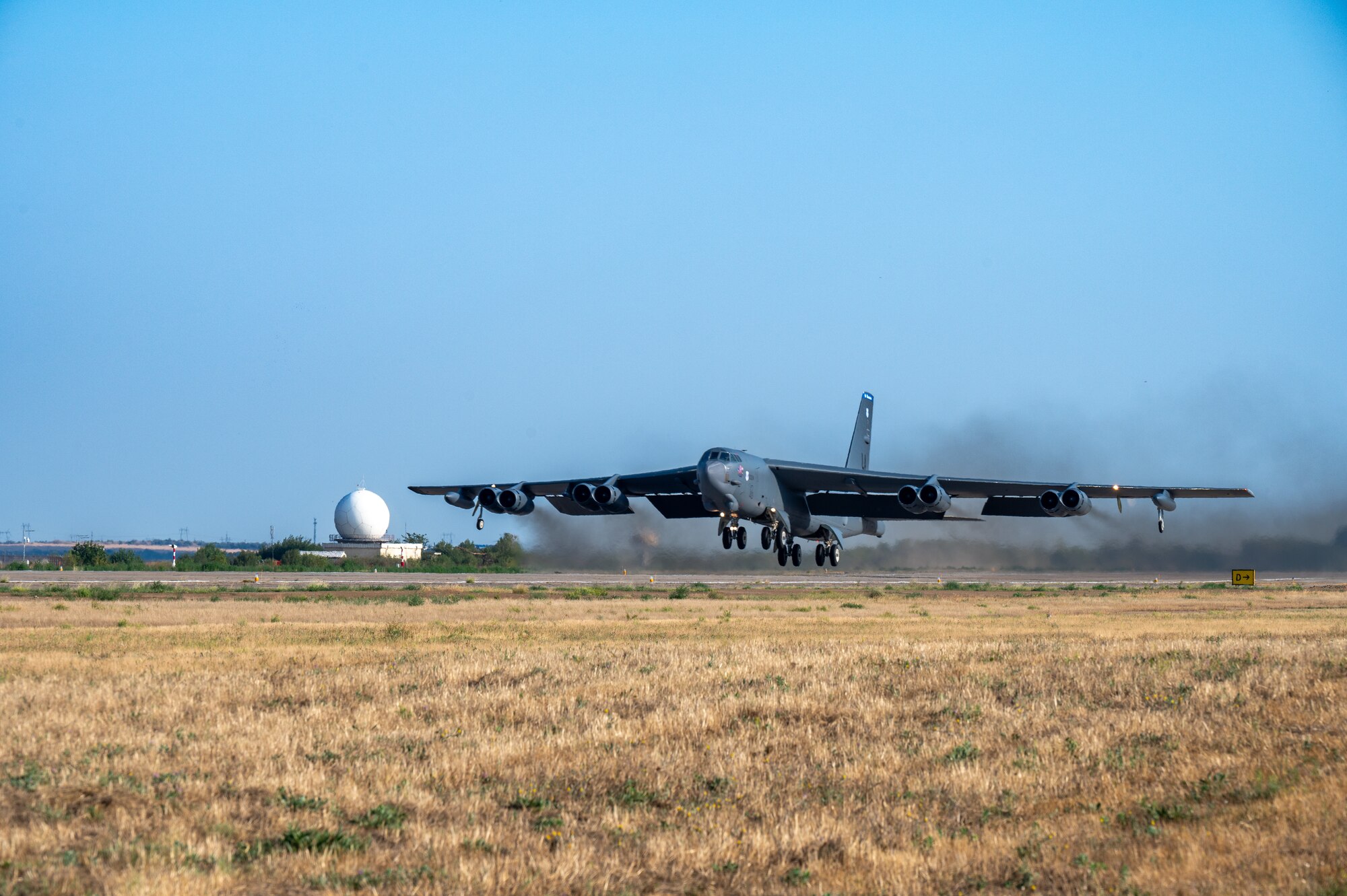A B-52H Stratofortress from the 20th Bomb Squadron, Barksdale Air Force Base, La., takes off from Mihail Kogălniceanu Air Base, Romania, as part of Bomber Task Force Deployment 24-4, July 27, 2024. Maintaining a capable U.S. presence in Europe strengthens U.S. national security by encouraging peace, unity, and cohesion between Europe’s individual nations. (U.S. Air Force photo by Senior Airman Seth Watson)
