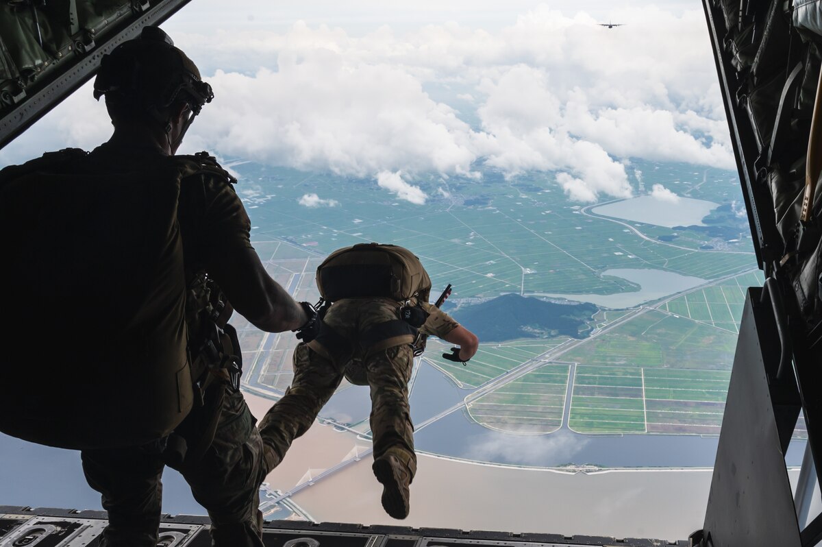 Airmen assigned to the 320th Special Tactics Squadron, conduct a military freefall jump out of an MC-130J Commando II assigned to the 1st Special Operations Squadron over Kunsan Air Base, Republic of Korea.
