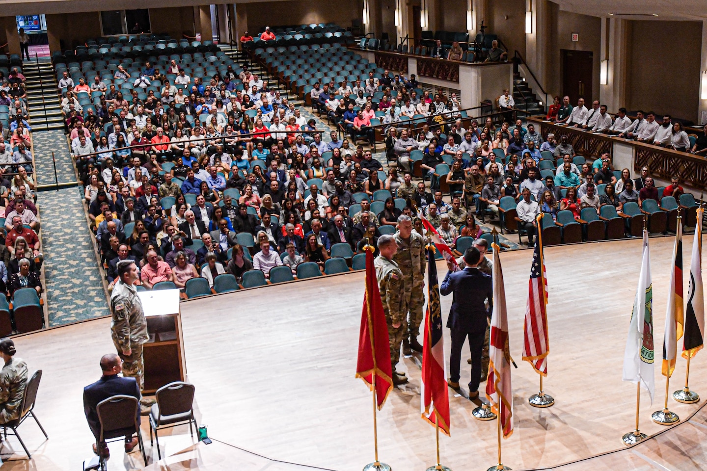 Mr. Howard Gonzales, U.S. Army Corps of Engineers Jacksonville Deputy District for Programs and Project Management, receives the organizational Colors,from the new commander Col. Brandon L. Bowman, during a Change of Command ceremony at the Performing Arts Jacoby Symphony Hall in Jacksonville Fl., July 26, 2025.