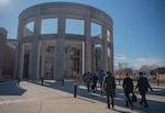 College of International Security Affairs Class of 2023 students walk into Abraham Lincoln Hall, National Defense University.
