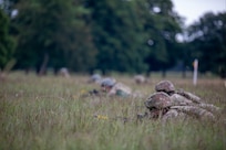 Members of Charlie Company, 3rd Battalion, 172nd Infantry Regiment (Mountain), 54th Troop Command, New Hampshire Army National Guard, hold their position during a simulated combat training during exercise RHINO HEART at the Normandy Barracks in Sennelager, Germany, on June 18, 2024.