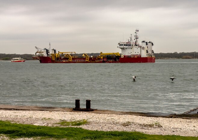 The trailing suction hopper dredge Padre Island from Great Lakes Dredge and Dock Company, LLC transits Galveston Harbor