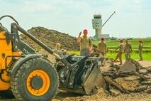 Civil engineers from around the country join forces to repair Minot AFB flightline